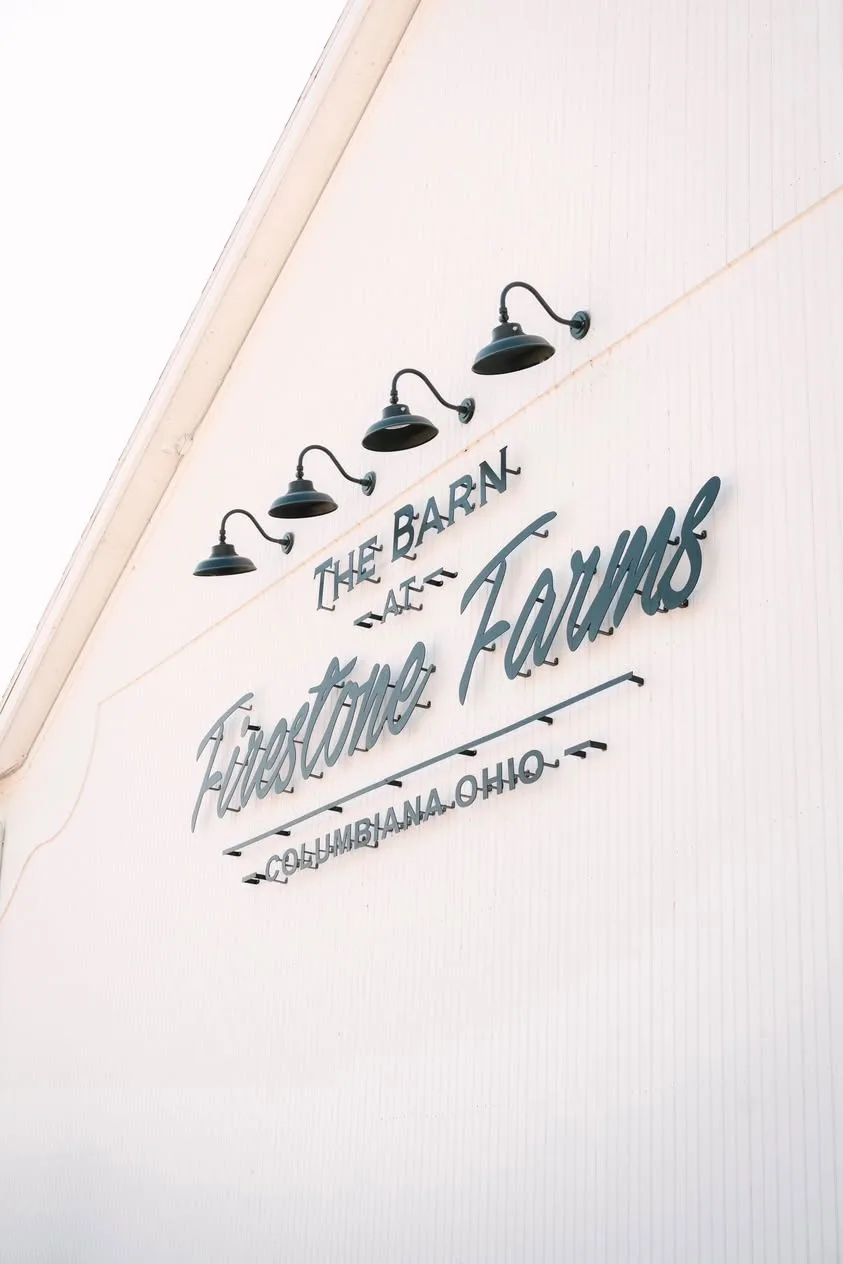 The Barn at Firestone Farms hand-lettered sign